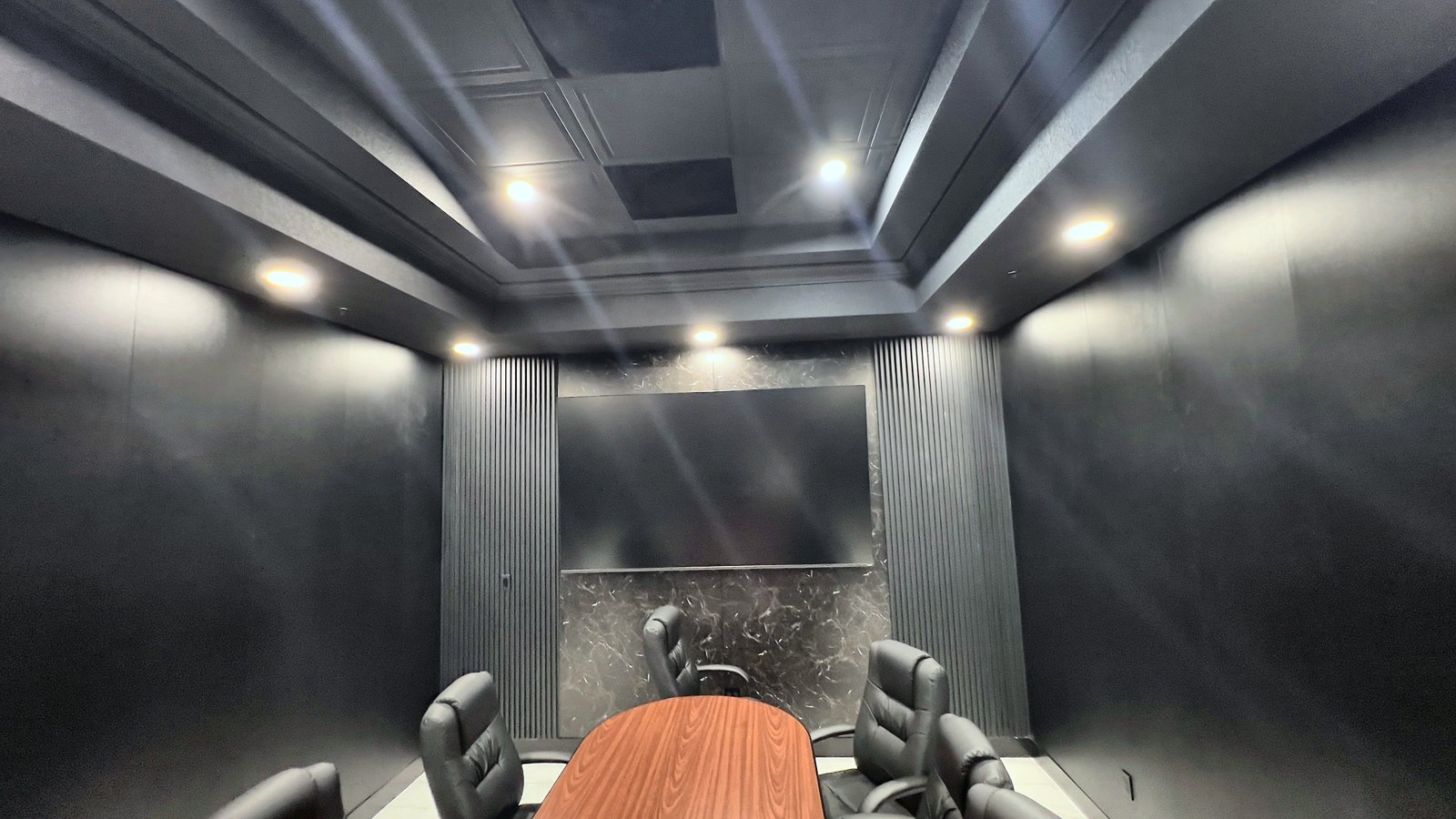 Conference room seating and slat wall detail — Lake Mary FL office buildout